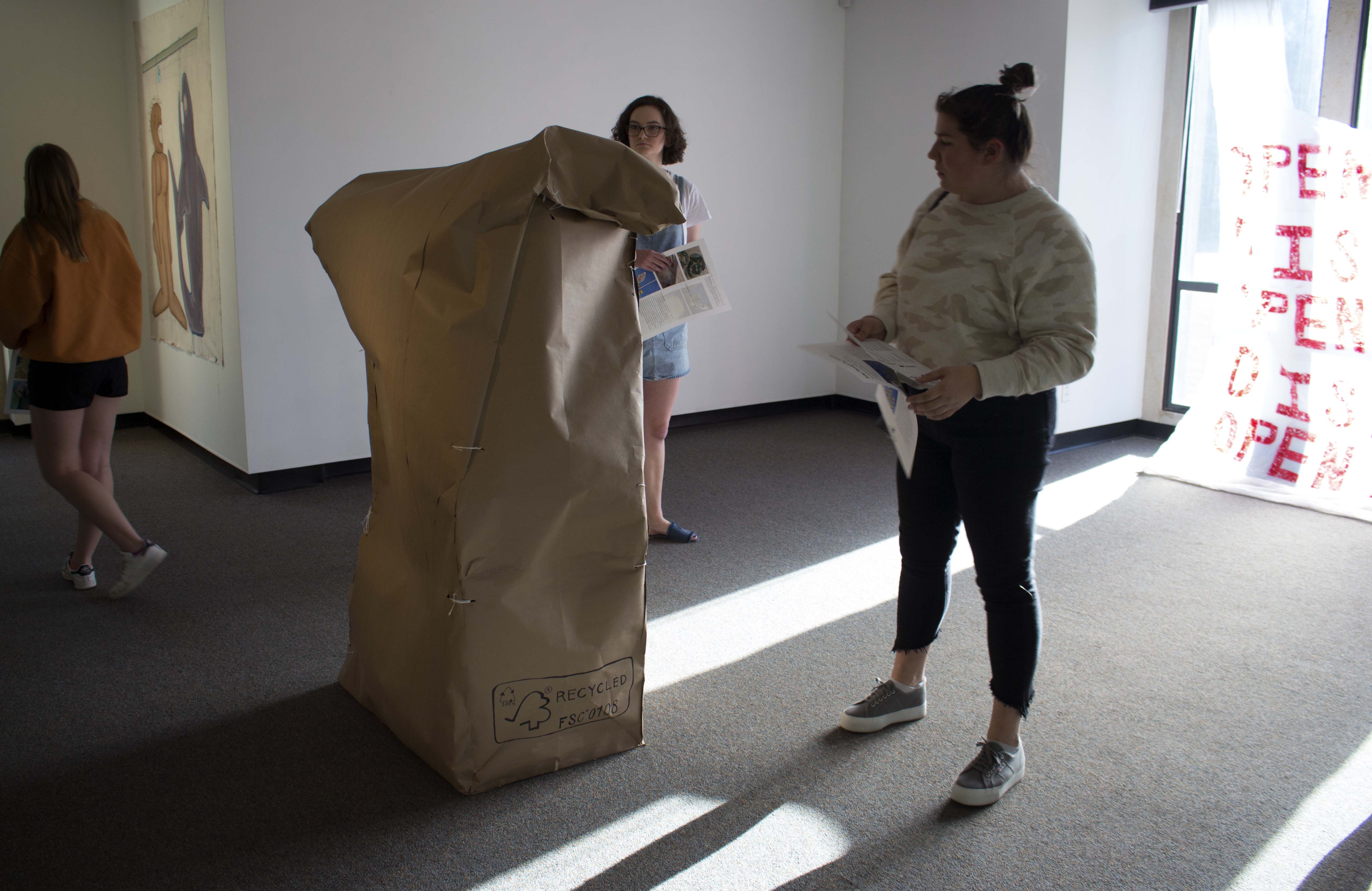 Life size paper bag sculpture.