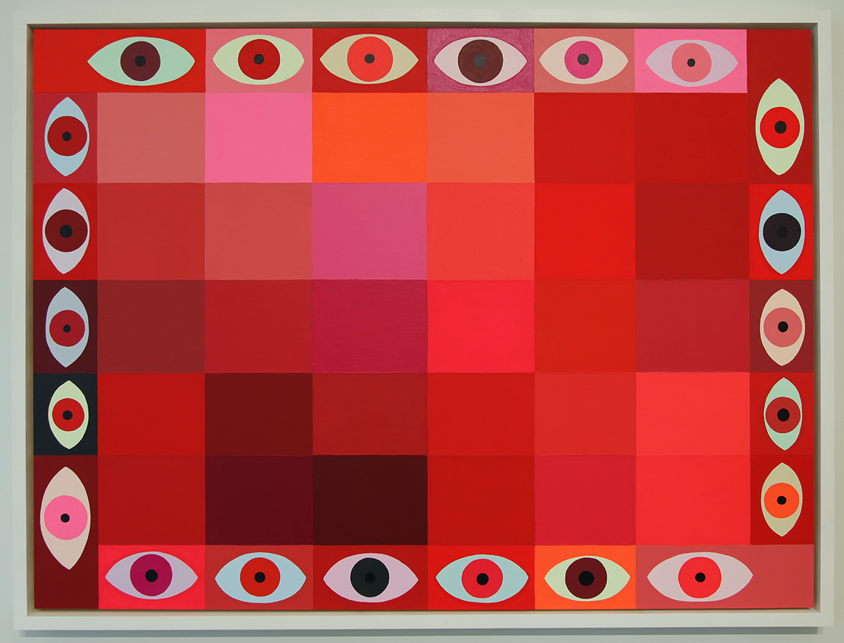 a patchwork painting in reds