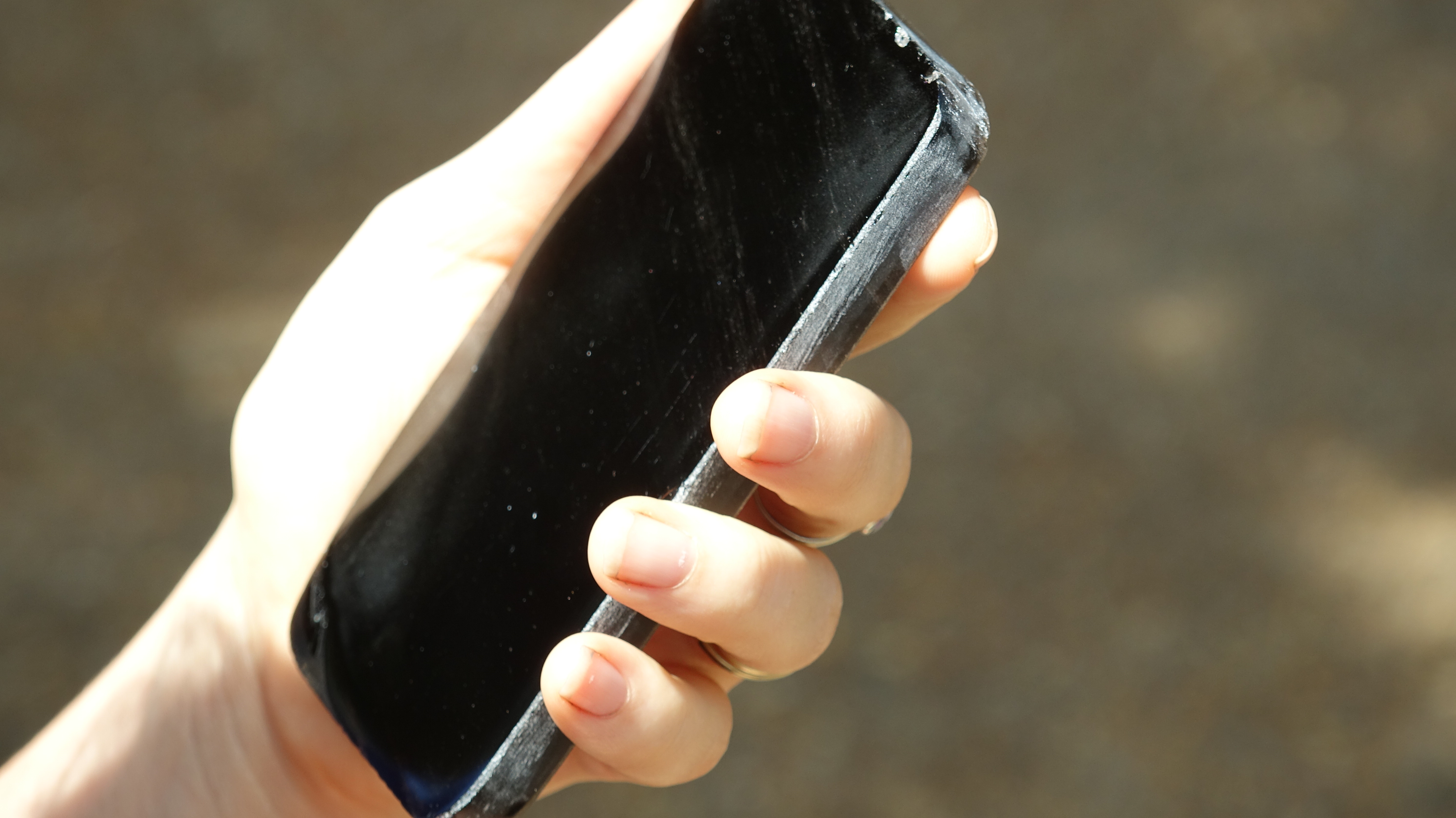photo of a hand with a phone