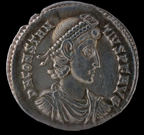 The obverse side of a coin that shows Constantius the second