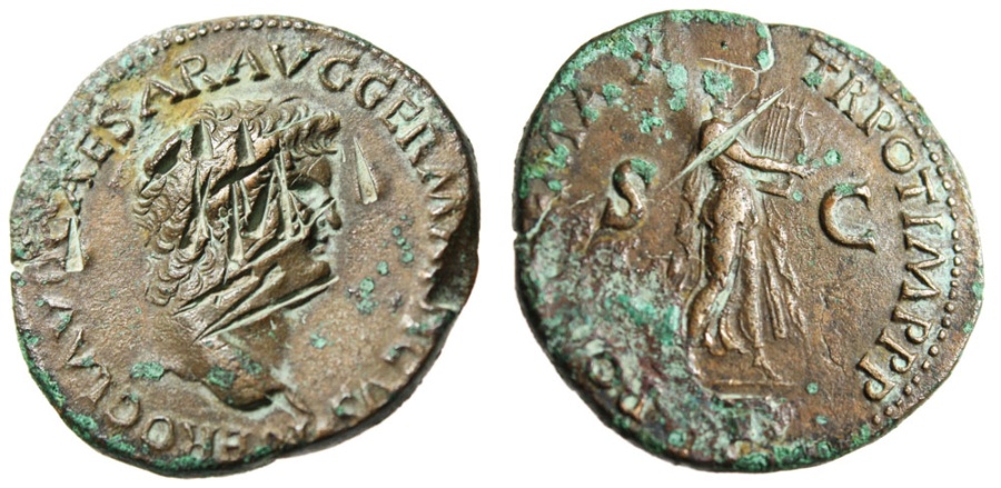 Coin of Nero with his face scratched out on the obverse and Apollo playing the lyre on the reverse