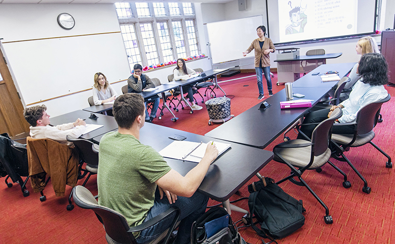 a professor leads a class in the Language Lab