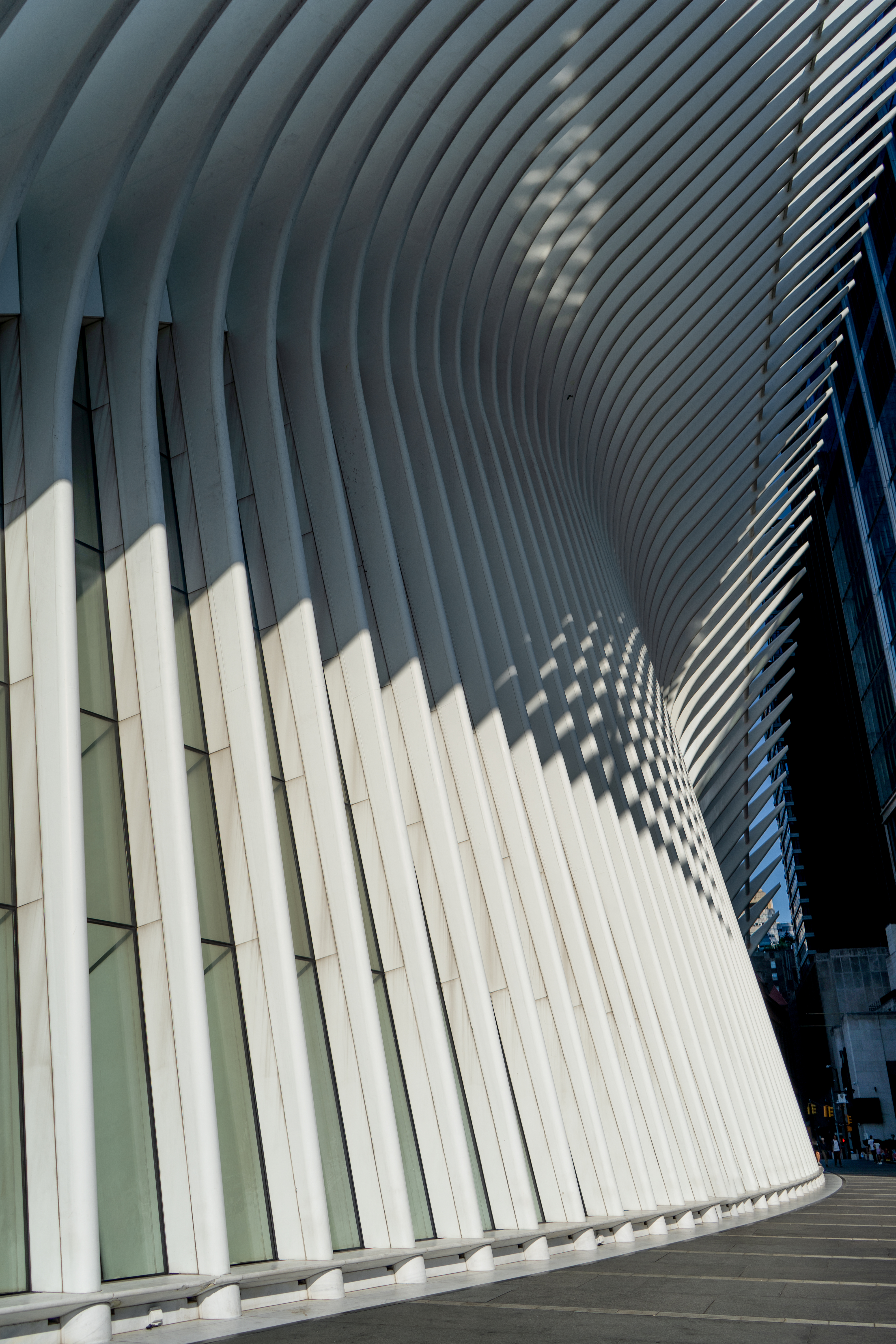 A side view of Manhattan's Oculus building in the afternoon