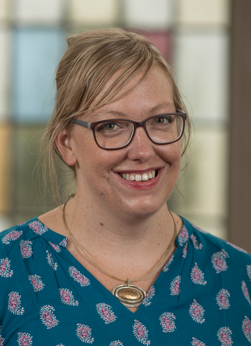 a female professor with glasses 