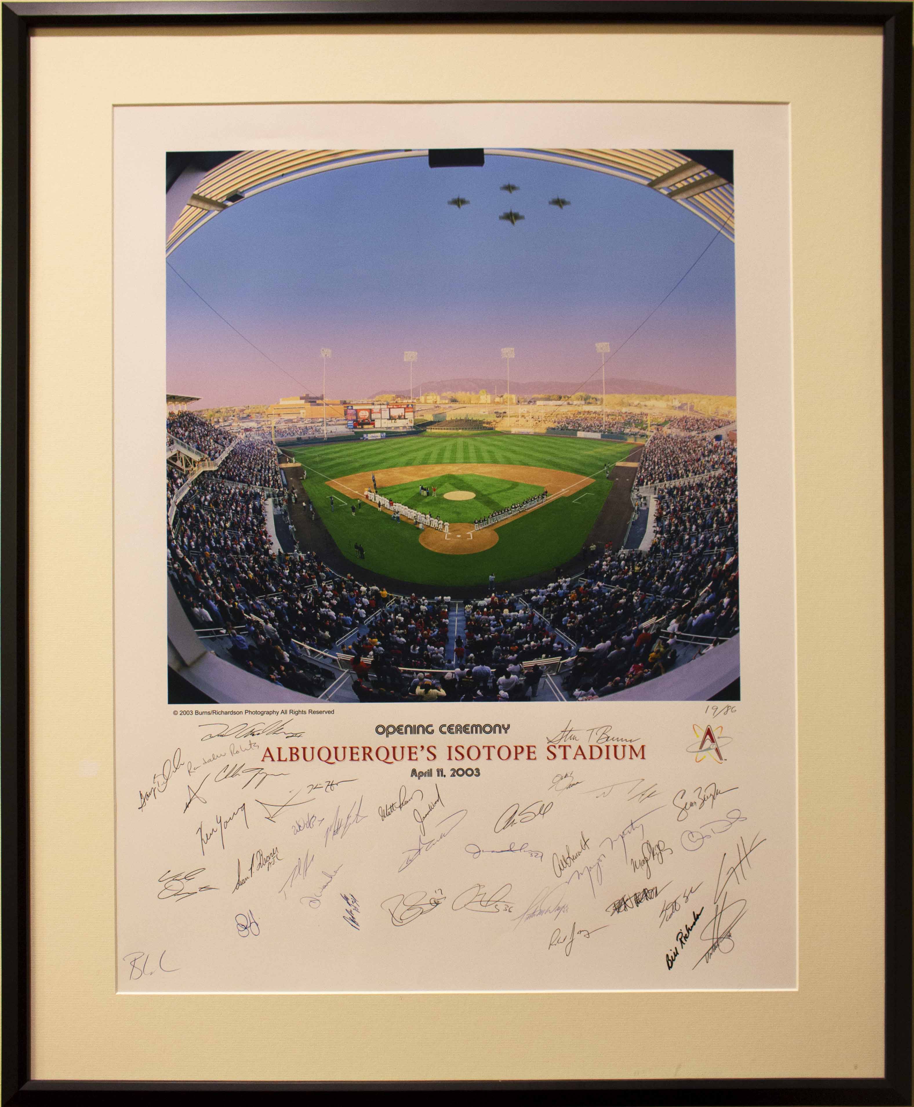 This is a print of the field at the opening ceremony of Albuquerque's minor league's stadium. Underneath the image are the team signatures. 
