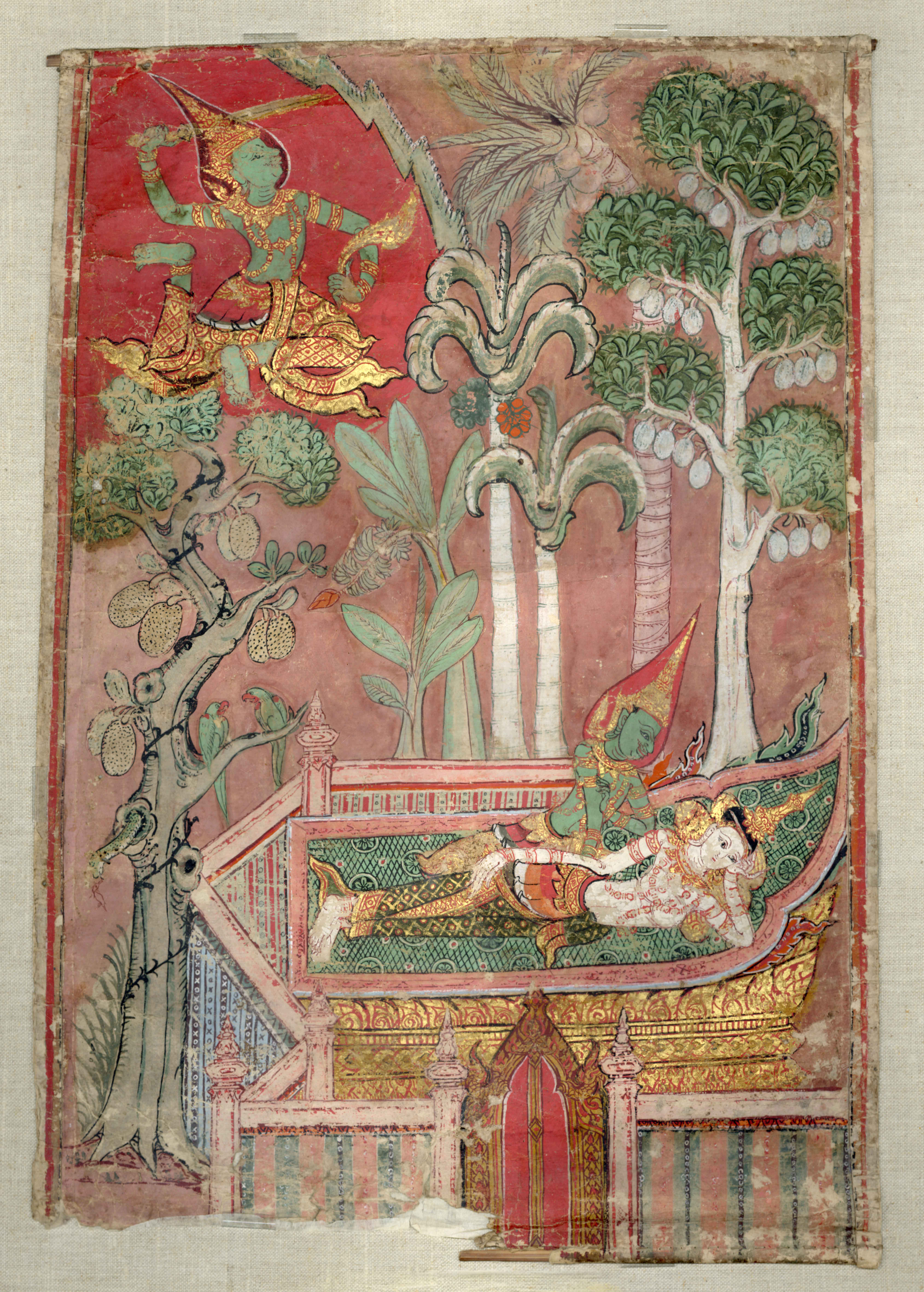 There is a reclining woman beside a green figure on a roof of a gold building. There are date, coconut, and breadfruit trees. There is a floating green figure in the upper lefthand corner. 