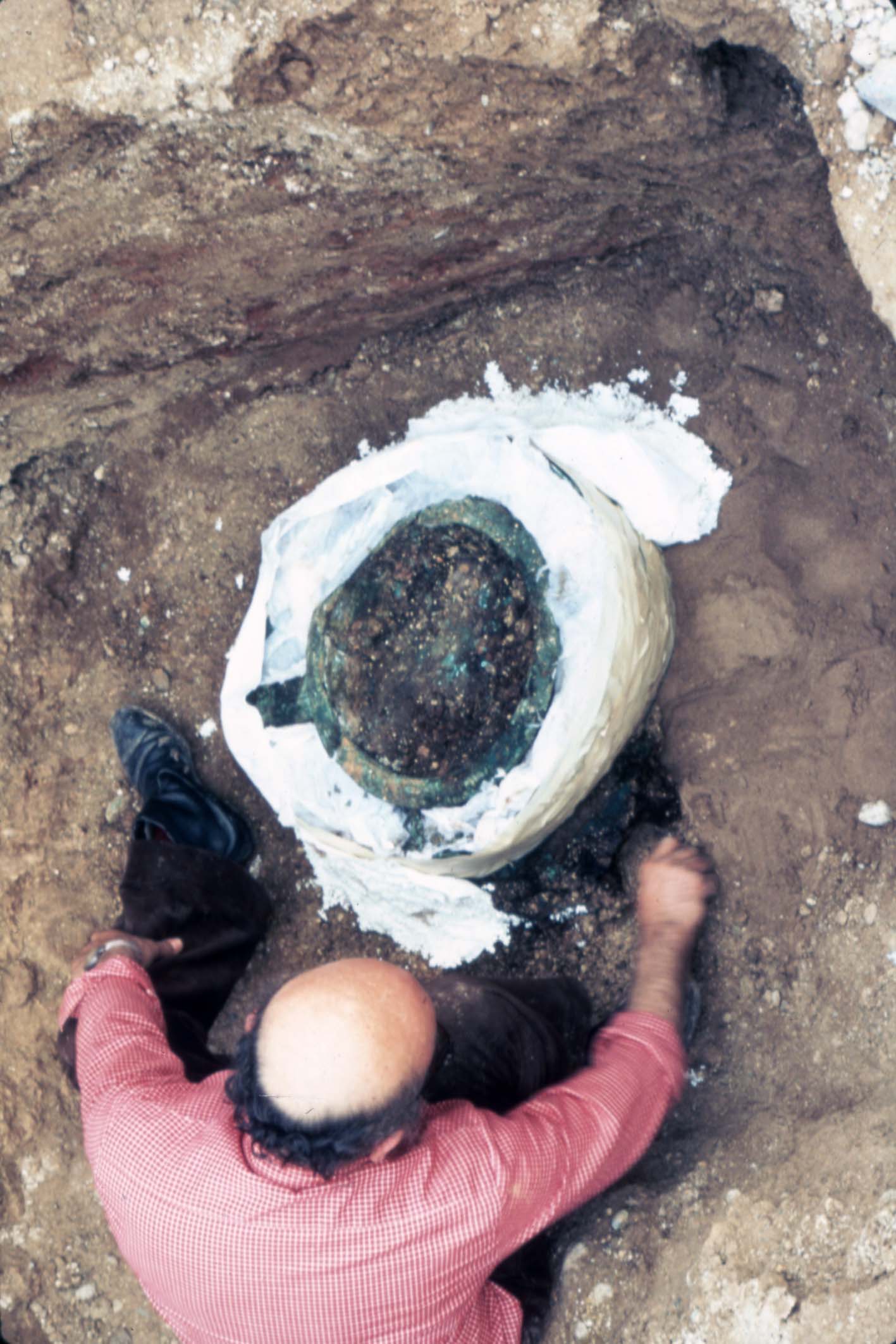 Lefkandi bronze vessel being excavated