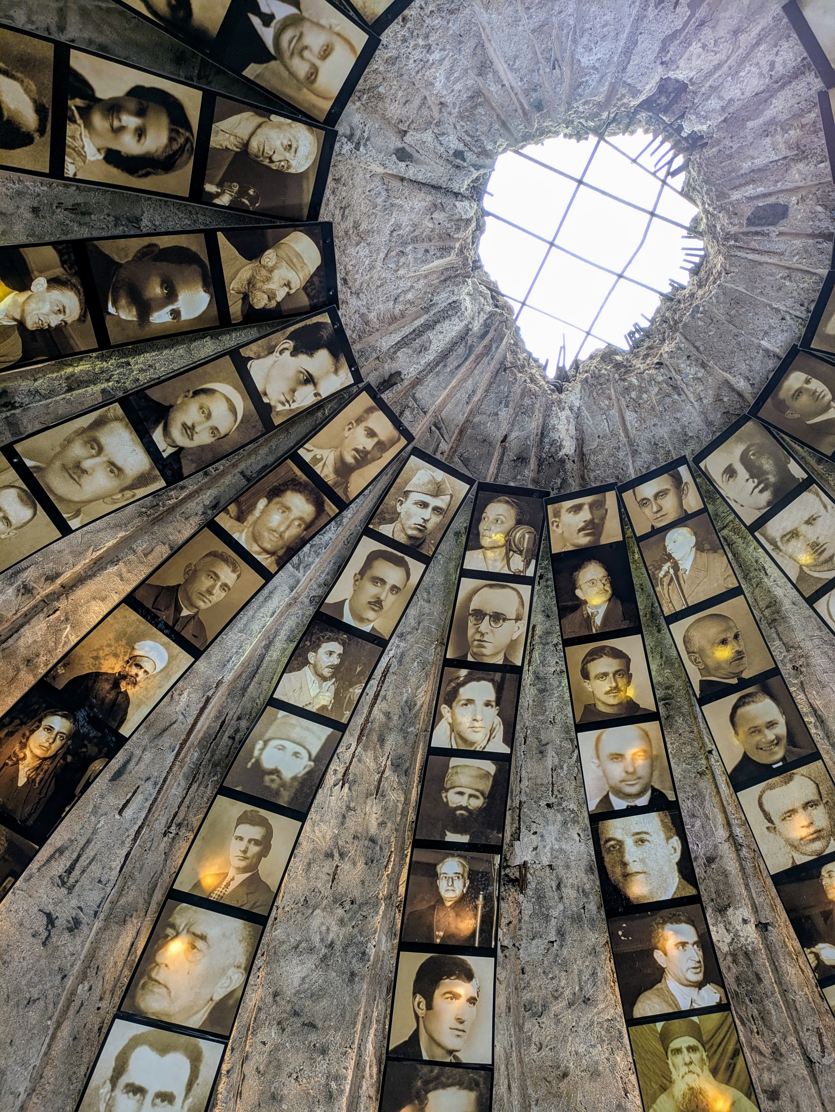 phtographs  of men inside a domed building