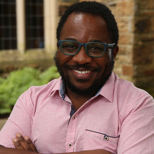 an African Aerican man with glasses