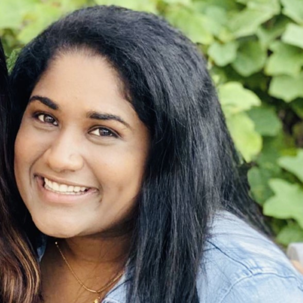 a young woman of Indian heritage with long black hair