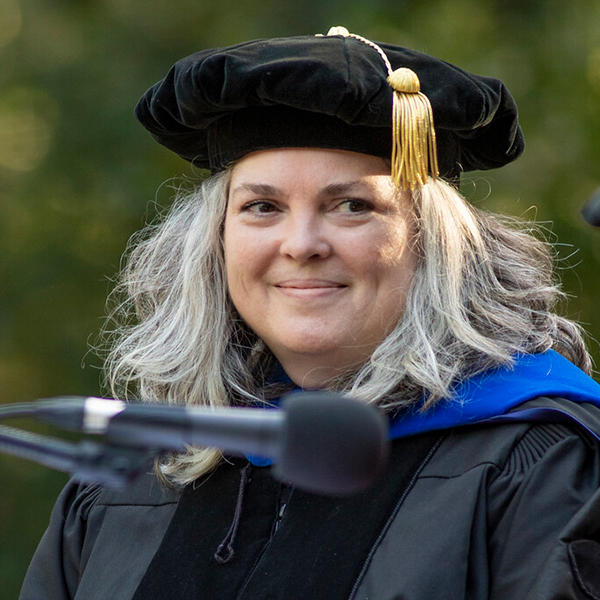 a woman in a professor's gown
