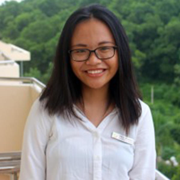 a young Vietnamese woman with glasses