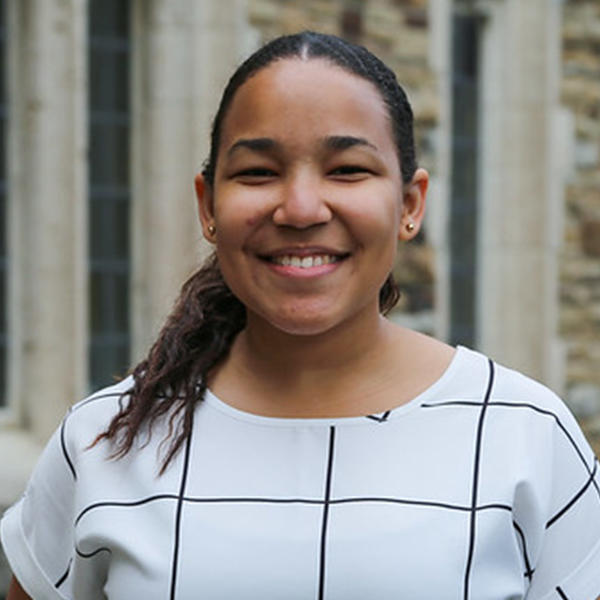 a young Jamaican woman with shoulder-length hair