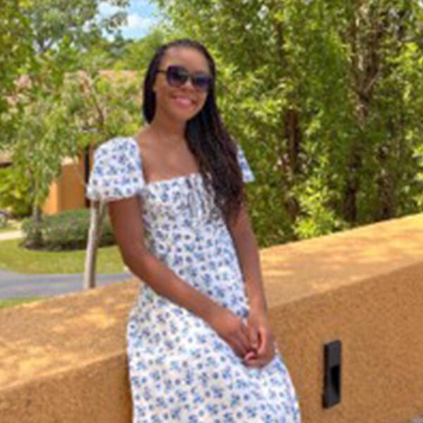 a young woman smiles at the camera