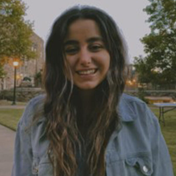 a young woman smiles at the camera