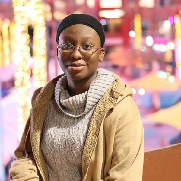 a young African American woman in a city, Asriyah Sisay|Saudia Arabia and United States |'27