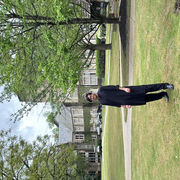 a young man in a field