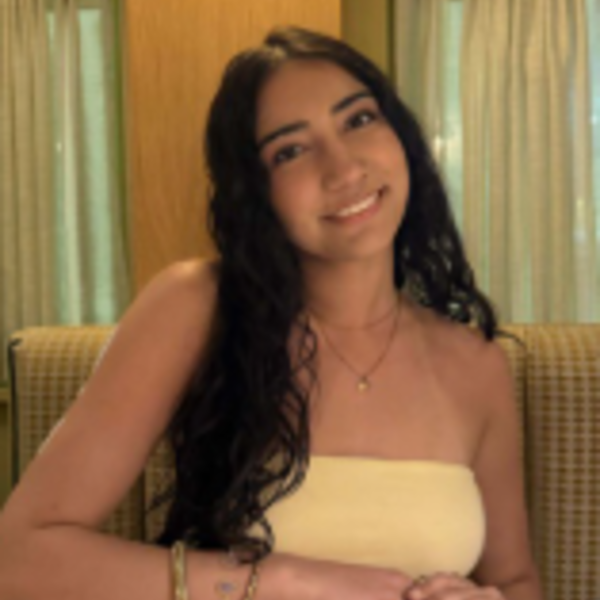 a female student with long dark hair 