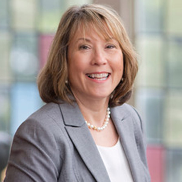 a woman in suit jacket